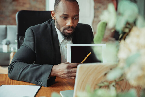 Businessman or student working from home while being isolated or keep quarantine cause of coronavirus COVID-19