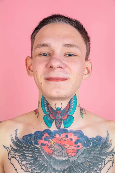 Portrait of young man with freaky appearance on pink background — Stock Photo, Image