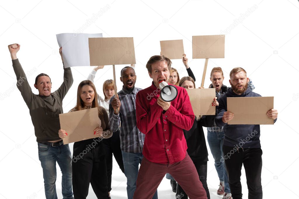Emotional multicultural group of people screaming while holding blank placards on white
