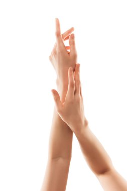 Beyaz arka planda izole edilmiş güzel kadın elleri. Güzellik, kozmetik, spa, nemlendirici, tedavi konsepti, hassas, duygusal poz