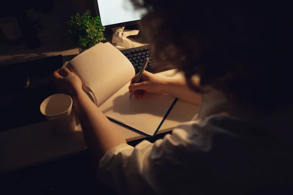 Man working in office alone during coronavirus or COVID-19 quarantine, staying to late night — Stock Photo, Image