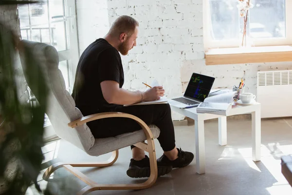 Young man studying at home during online courses for programmer, bug-tester, consulter — Stock Photo, Image