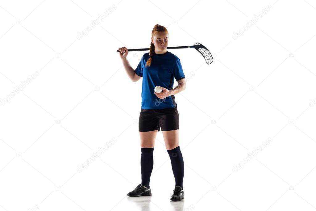 Floorball female player isolated on white studio background, action and motion concept