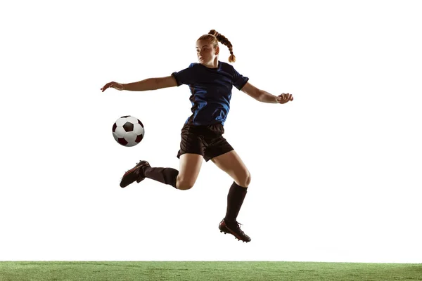 Fútbol femenino, jugador de fútbol pateando pelota, entrenamiento en acción y movimiento con emociones brillantes aisladas sobre fondo blanco —  Fotos de Stock