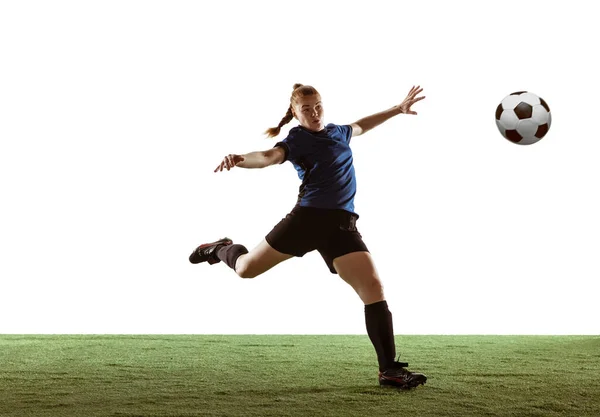 Fútbol femenino, jugador de fútbol pateando pelota, entrenamiento en acción y movimiento con emociones brillantes aisladas sobre fondo blanco — Foto de Stock