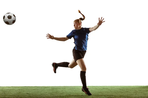 Futebol feminino, jogador de futebol chutando bola, treinamento em ação e movimento com emoções brilhantes isoladas no fundo branco — Fotografia de Stock