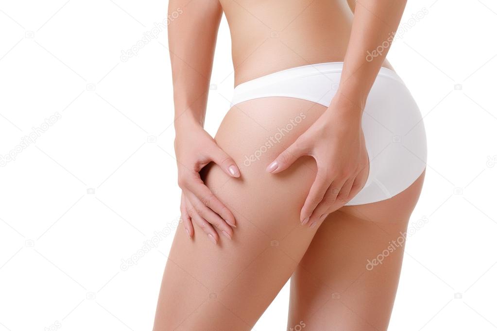 Checking cellulite woman hip close up