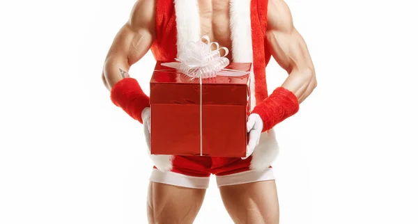 Fitness Santa holding a red box — Stock Photo, Image