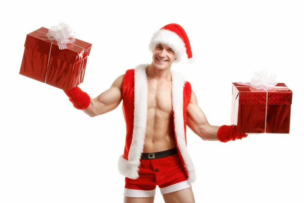 Fitness sexy Santa Claus gospodarstwa czerwone pola — Zdjęcie stockowe