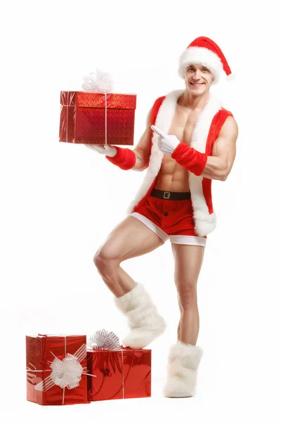 Fitness Santa Claus shows a red box — Stock Photo, Image