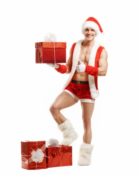 Fitness Santa pointing like a red box — Stock Photo, Image