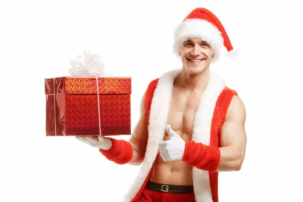 Fitness Santa pointing like a red box — Stock Photo, Image