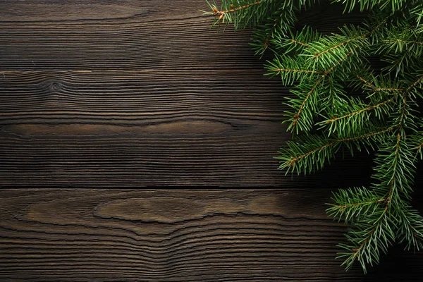 Fondo de madera de Navidad con abeto — Foto de Stock