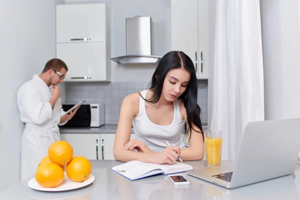 Couple using gadgets and planning day. — Stock Photo, Image