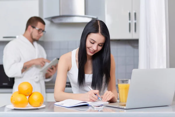 Couple using gadgets and planning day. — Stock Photo, Image