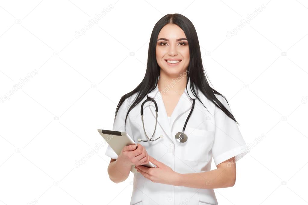 Nurse at hospital holding documents with information about of patient.