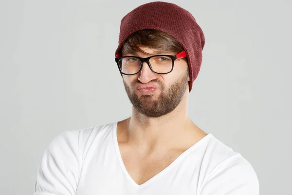 Handsome young man posing at studio — Stock Photo, Image