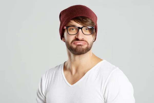 Handsome young man posing at studio — Stock Photo, Image