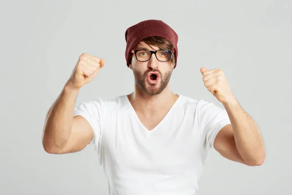 Handsome young man posing at studio — Stock Photo, Image