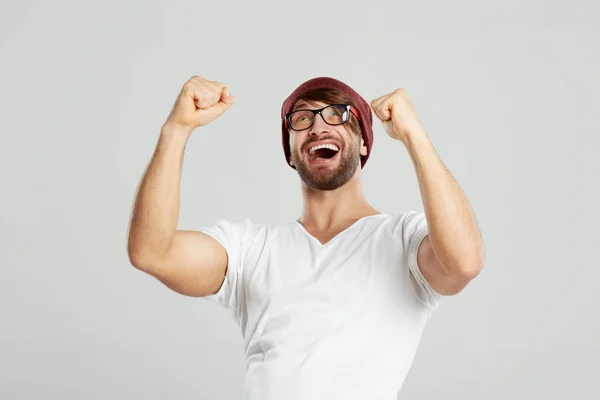 Handsome young man posing at studio — Stock Photo, Image