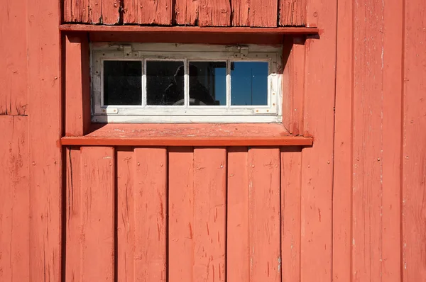 Red traditional Norwegian wall with window — Stock Photo, Image