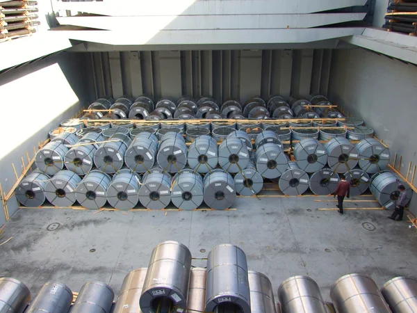 Coil steel ,TMBP steel,Packed rolls of coil steel in stock in shipment transportation boat — Stock Photo, Image