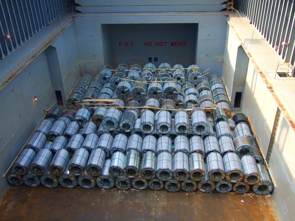 Coil steel ,TMBP steel,Packed rolls of coil steel in stock in shipment transportation boat — Stock Photo, Image