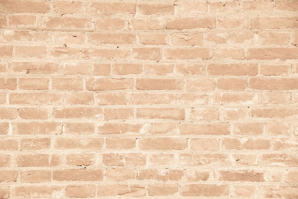 Beige grunge brick wall texture background