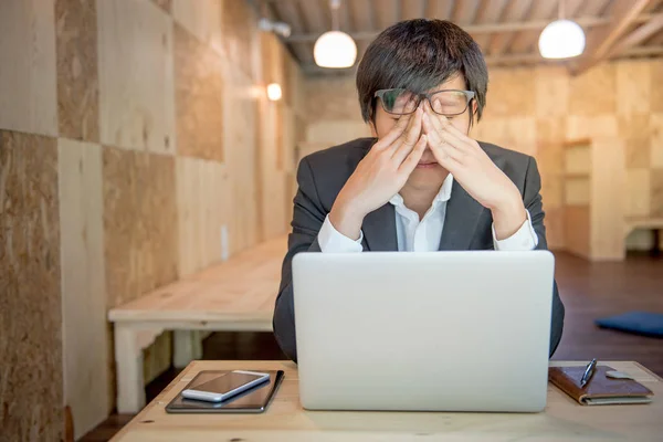 Frustrated stressed business man in workplace — Stock Photo, Image