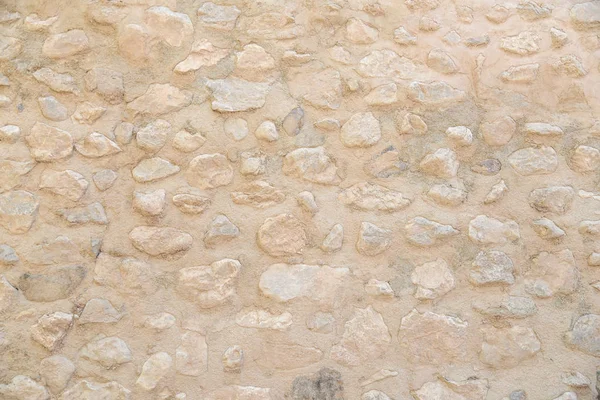 Oude beige stenen muur patroon — Stockfoto