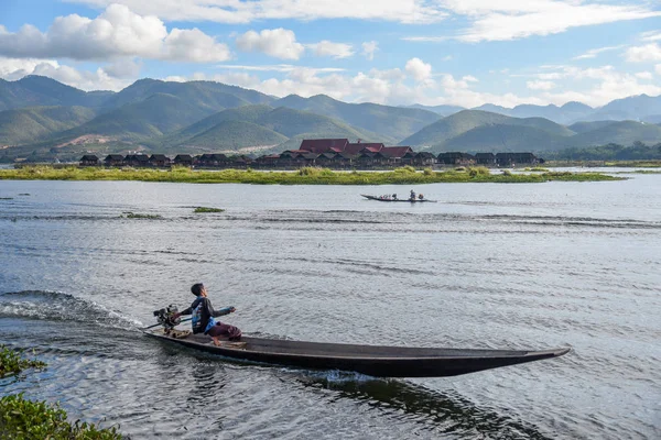 local man on the boat in Inle lake, Myanmar