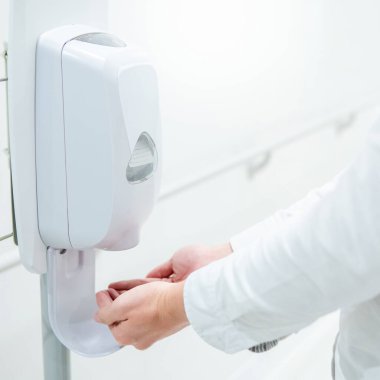 Automatic alcohol dispenser in hospital
