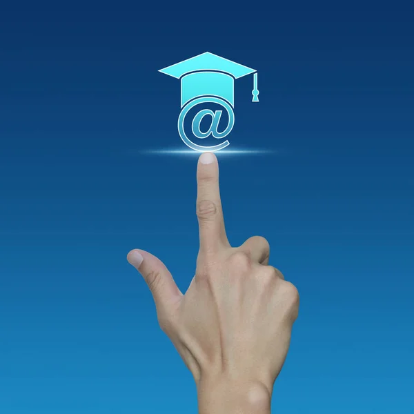 Mão pressionando ícone de e-learning no fundo azul — Fotografia de Stock