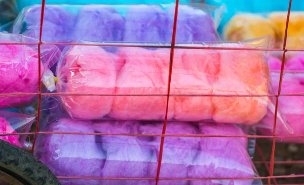 Sweet cotton candy on plastic bag — Stock Photo, Image