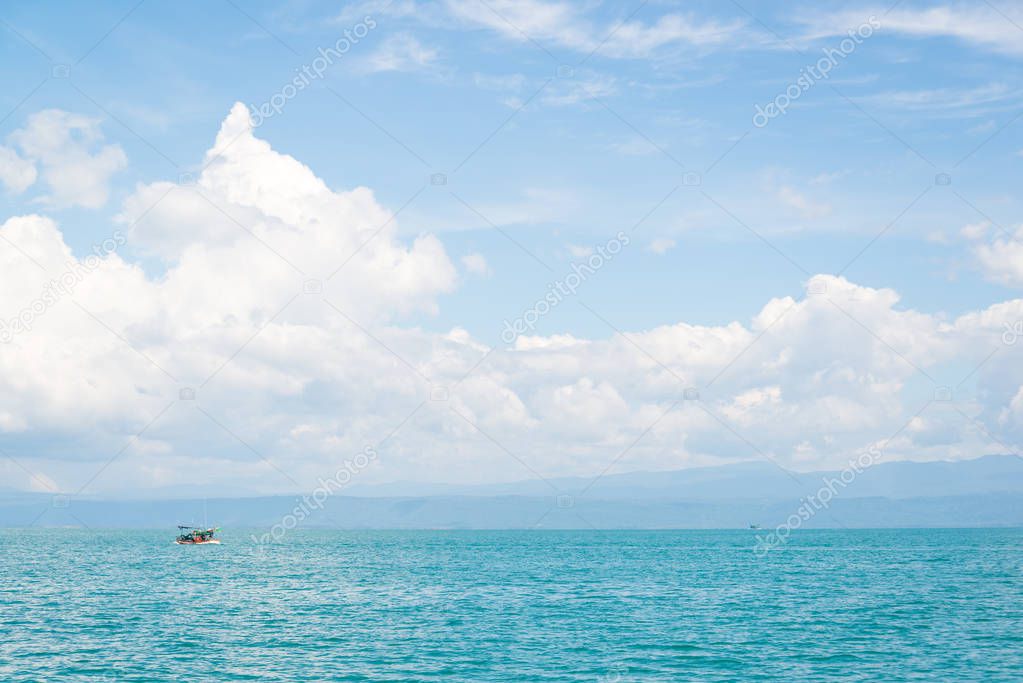 boat in the blue sea 