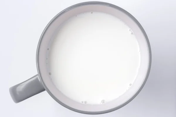 Felülnézet pohár tej / üveg fehér tejet az fenti — Stock Fotó