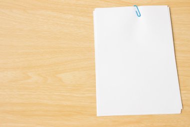 empty notepad and wood table, on the white wooden background
