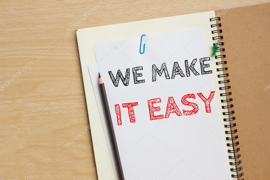 Text we make it easy on white paper with pencil on the desk / business concept