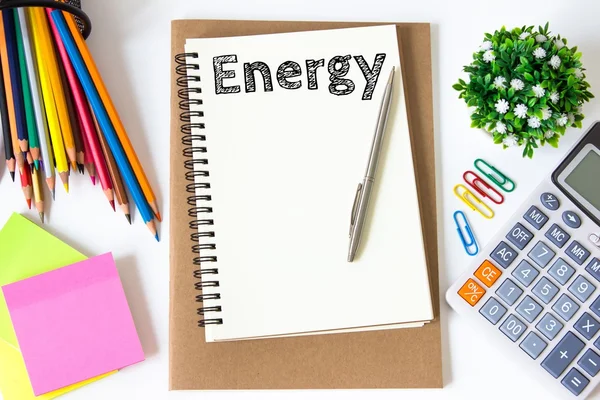 Energy text message on white paper and office supplies, pen, paper note, on white desk , copy space / business concept / view from above, top view — Stock Photo, Image