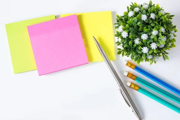 colorful sticky note paper on a white background.