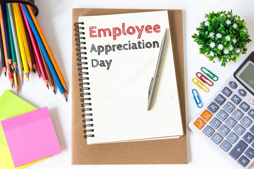 employee appreciation day text message on white paper and office supplies, pen, paper note, on white desk , copy space / business concept / view from above, top view