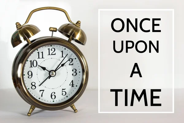 Once upon a time, bericht op de klok achtergrond/tijd concept — Stockfoto