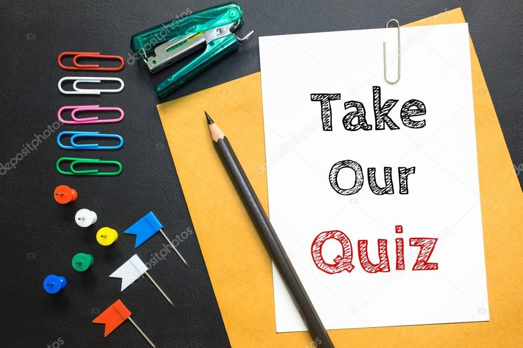 Text Take our quiz on white paper with pencil on background
