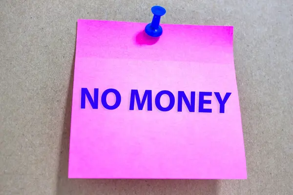 Text NO MONEY on paper note / Finance concept