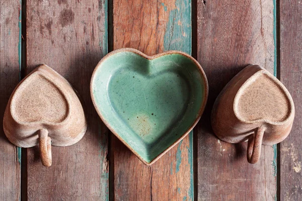 Saucer and cup on wooden. — Stock Photo, Image