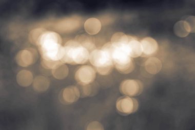 Gri arka plan üzerinde bokeh.