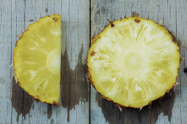 Pineapple cut on wooden. — Stock Photo, Image