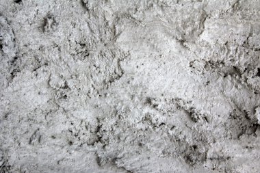 Aşınmış eski gri bir duvar kirli doku, arka plan için beton