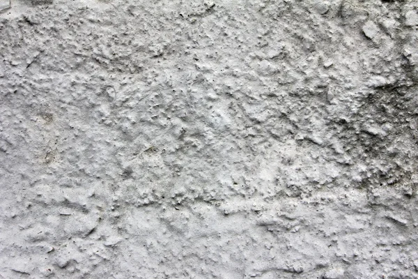 Vieux béton gris érodé sur un mur pour une texture sale, fond — Photo