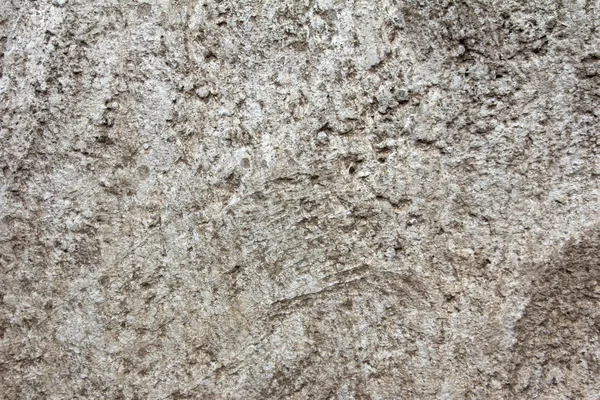 Vieux béton gris érodé sur un mur pour une texture sale, fond — Photo